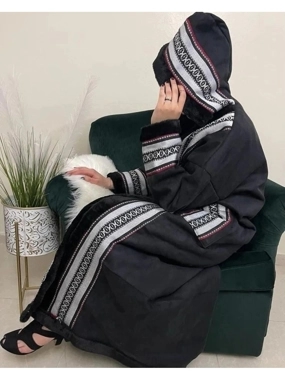 Black winter fur coat with a traditional Arabic Sadu design