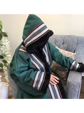 Olive-colored winter fur coat with an Arabic Sadu design