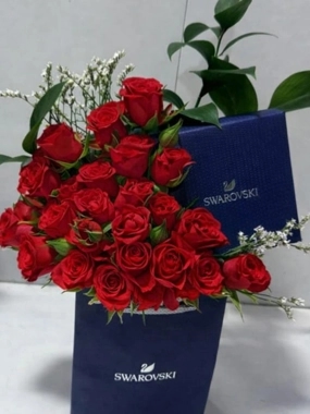 Baby rose arrangement with a Swarovski bracelet