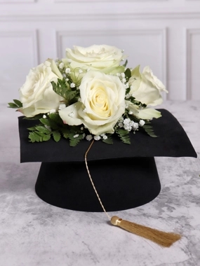 Graduation Cap With White Flowers