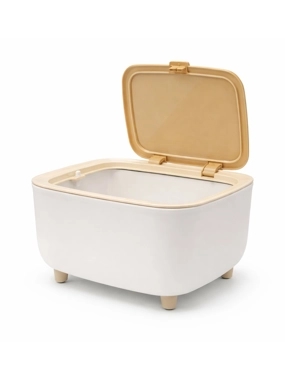 Small trash can with a press operated lid