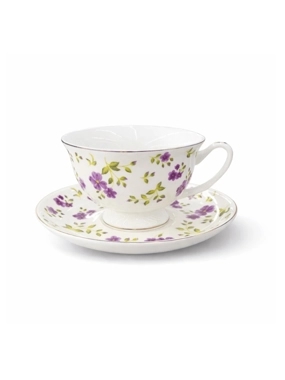 Porcelain cup with an elegant saucer featuring a luxurious pattern
