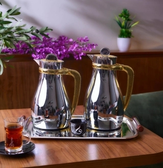 Aurora Thermos Set from Tavolo Made of high-quality metal, featuring a silver color with a marble-patterned lid