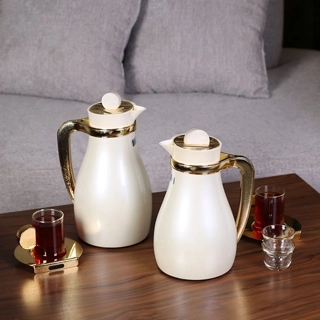 Aurora Thermos Set from Tavolo Made of high-quality metal, featuring a pearl color with a marble-patterned lid