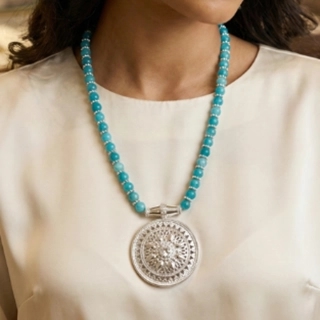 A luxurious heritage necklace made of silver and precious stones