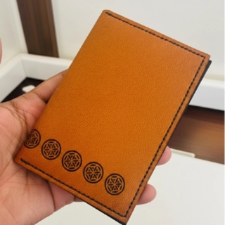 Handmade passport cover made of genuine leather with multi-colored heritage patterns