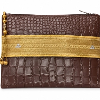 A luxurious bag made of royal dark brown leather and hand-stitched gold zari.