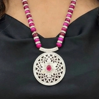 A luxurious heritage necklace made of silver and precious stones