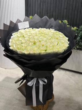 A large bouquet of white roses