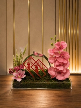 Newborn girl stand with flowers