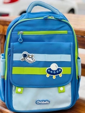 Sky-blue boys' backpack featuring an astronaut design – Al-Ishraq