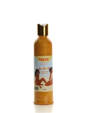 There she glows shimmering tanning oil