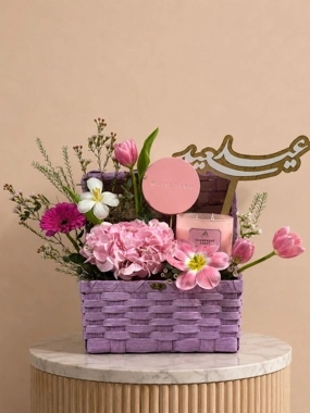 Arranging a festive glow basket with candles