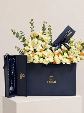 Rosary with a rose arrangement