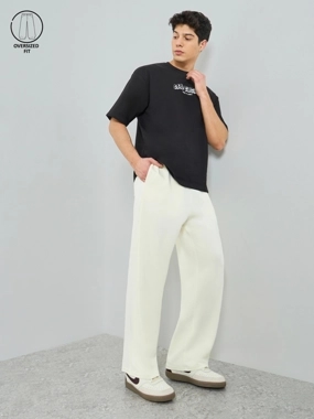 Styli Limited Men Oversized Pants with Pocket Badge