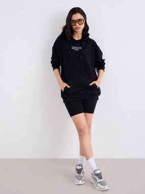 Styli Oversized Fit Longline Slogan Hoodie