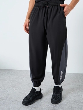 Styli Active Men Black Placement Print Regular Fit Track Pants with Side Panel