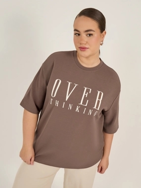 Styli Plus Size Slogan Print Dropped Shoulder Oversized T-Shirt