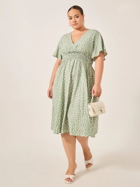Styli Plus Size All-Over Printed V Neck A-Line Midi Dress