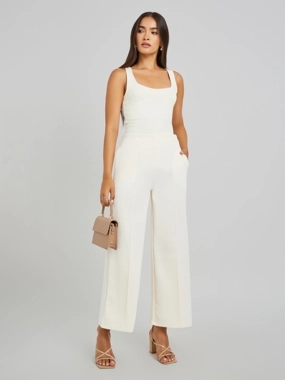 Styli Pin Tuck Detail Slit Hem Straight Knit Pants