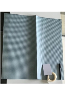 Paper wrapping with ribbon and card