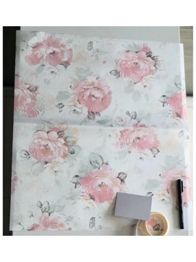 Paper wrapping with ribbon and card