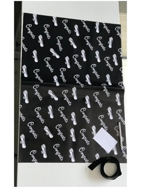 Paper wrapping with ribbon and card