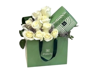 White roses arrangement with Patchi chocolates